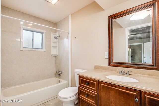 full bathroom with tile patterned floors, vanity, toilet, and tiled shower / bath