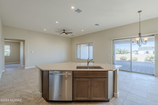 kitchen with a wealth of natural light, dishwasher, and sink