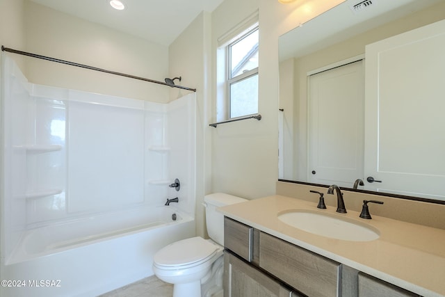 full bathroom featuring vanity, toilet, and bathing tub / shower combination