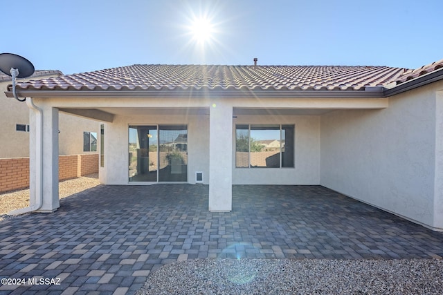 rear view of house with a patio area