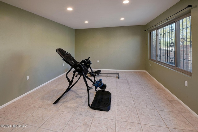 workout area with light tile patterned flooring