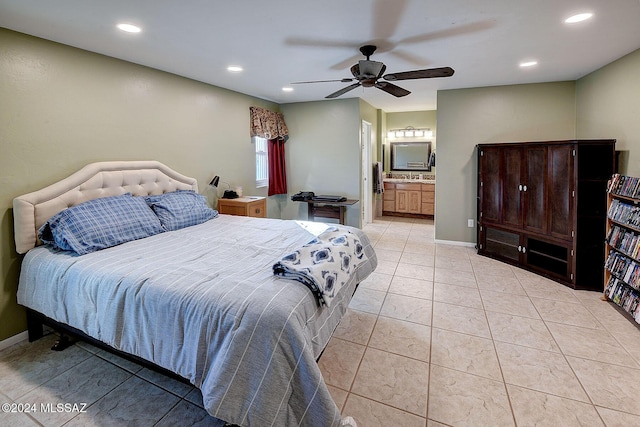 bedroom featuring ceiling fan, connected bathroom, and light tile patterned floors