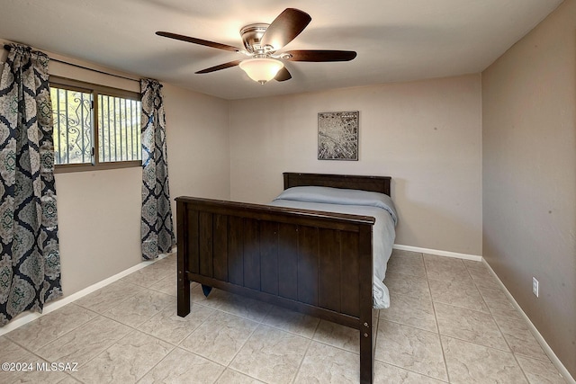 bedroom with light tile patterned floors and ceiling fan