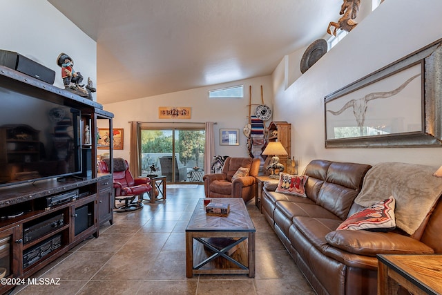 living room with tile patterned floors and vaulted ceiling