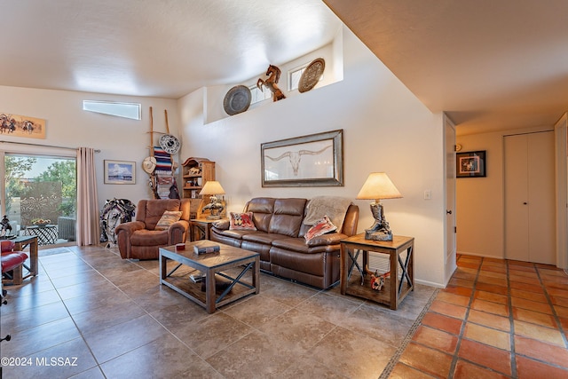 living room with tile patterned floors