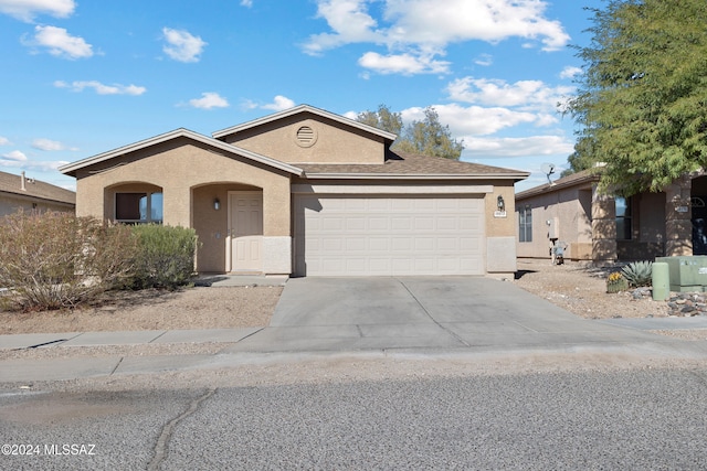 ranch-style house with a garage