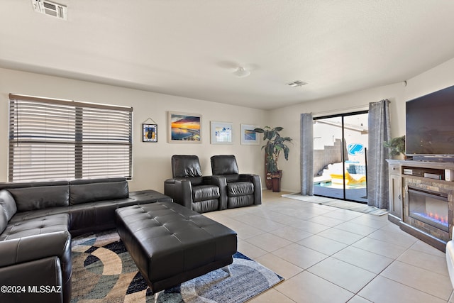 living room with light tile patterned floors