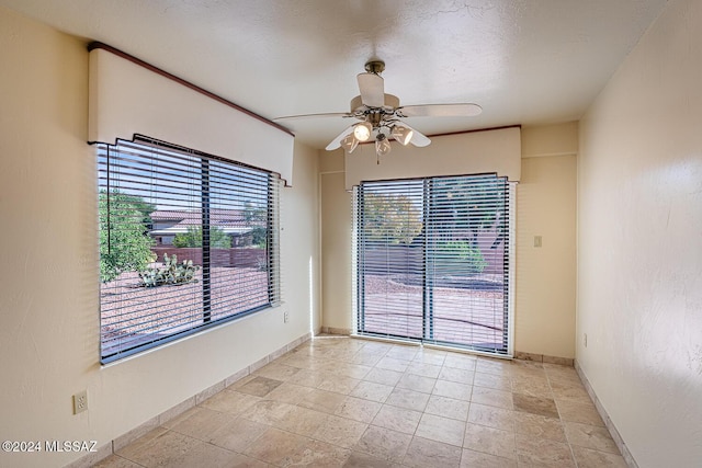 empty room with ceiling fan