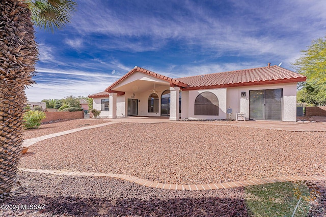 rear view of house featuring a patio area