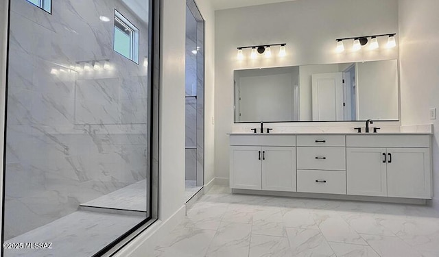 full bath featuring a sink, double vanity, and marble finish floor