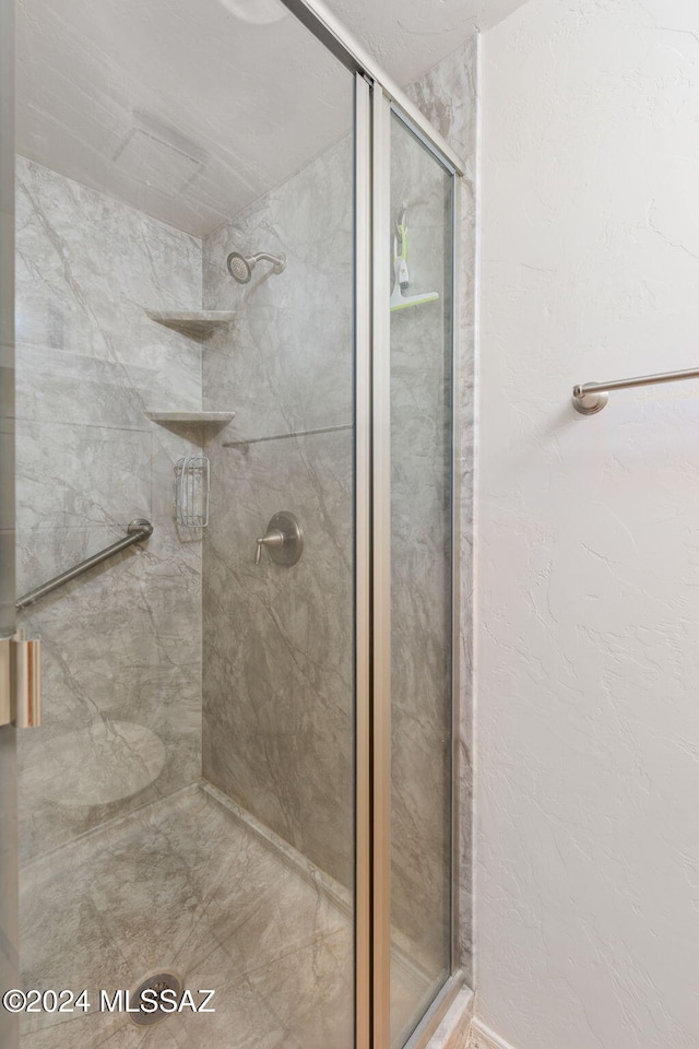 bathroom featuring walk in shower