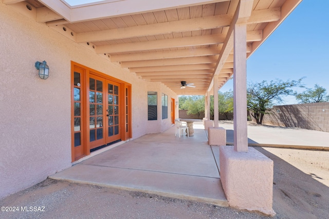 view of patio with ceiling fan and french doors