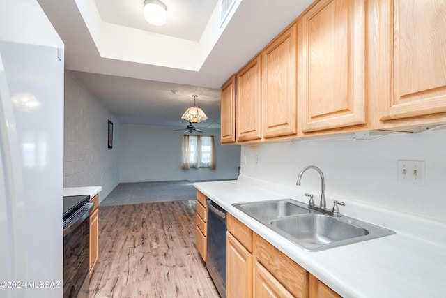 kitchen with light brown cabinetry, dishwasher, sink, hanging light fixtures, and electric range