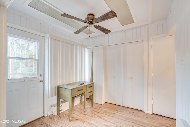 interior space with ceiling fan and light wood-type flooring