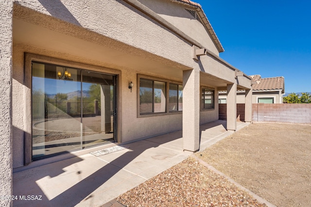 property entrance with a patio