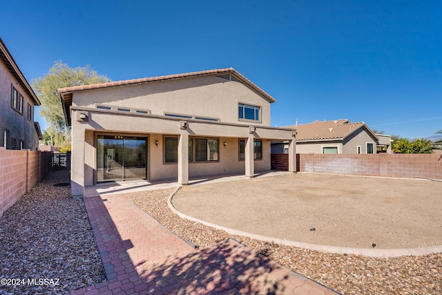 rear view of house with a patio area