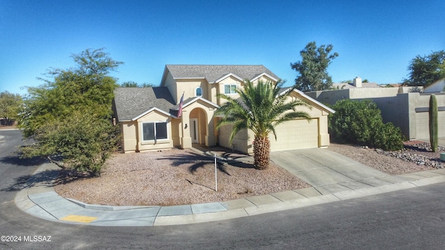 view of front of home with a garage