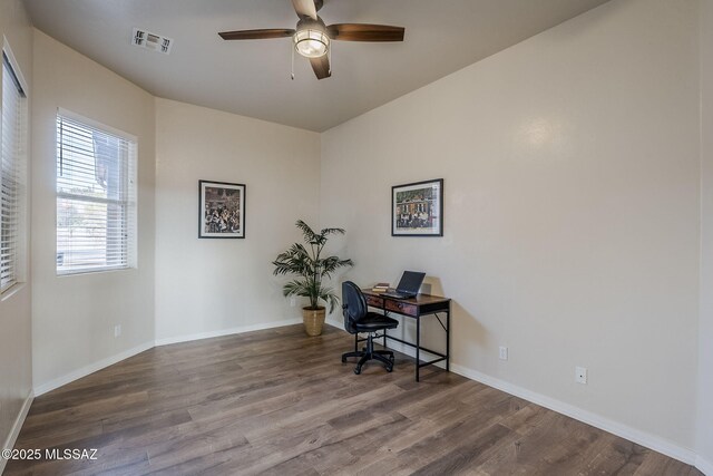 tiled dining area with sink and ceiling fan