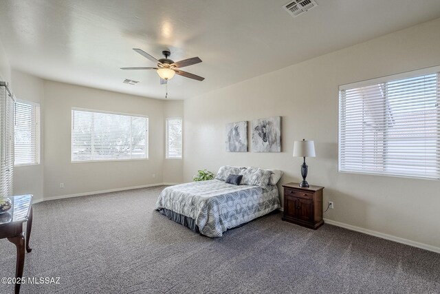 office with hardwood / wood-style flooring, a healthy amount of sunlight, ceiling fan, and ornate columns