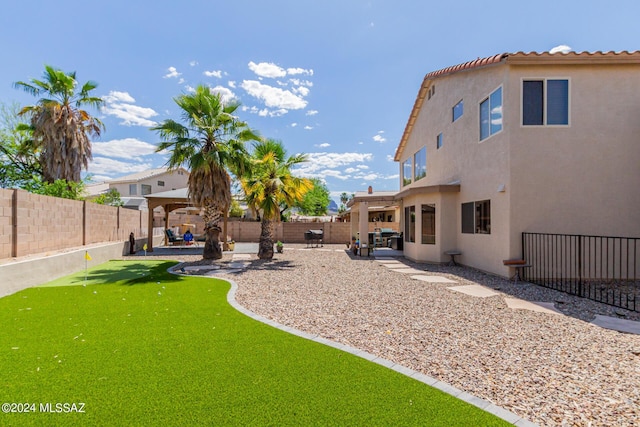 view of yard with a gazebo and a patio