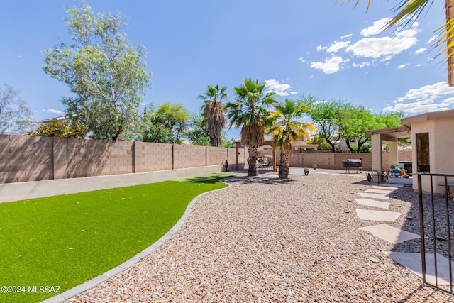 view of yard with a patio area