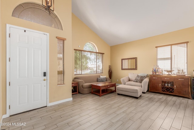 entryway with high vaulted ceiling