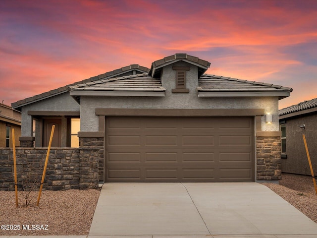 view of front of property with a garage