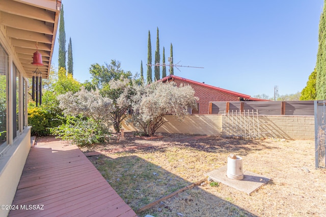 view of yard with a deck