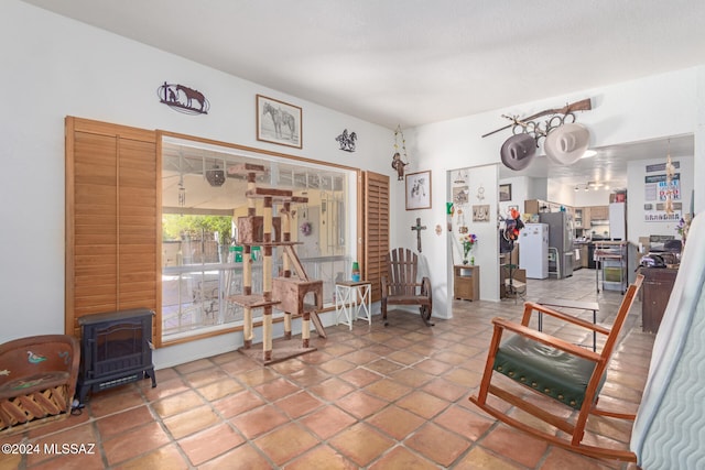 sitting room with a wood stove