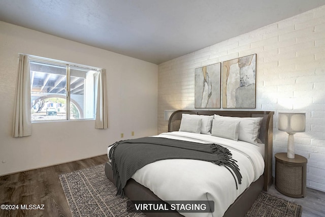 bedroom featuring dark hardwood / wood-style floors