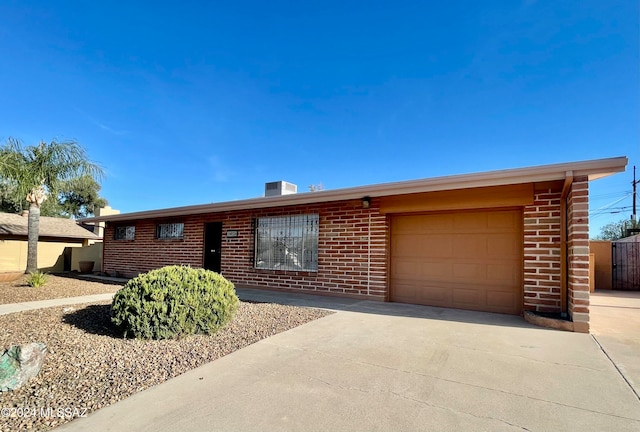 ranch-style home with a garage