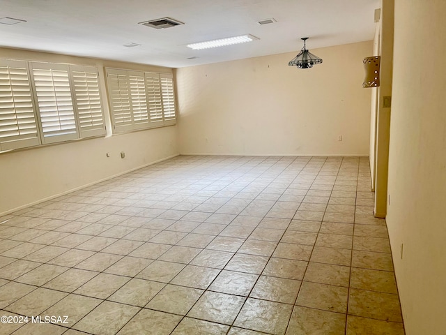 view of tiled empty room