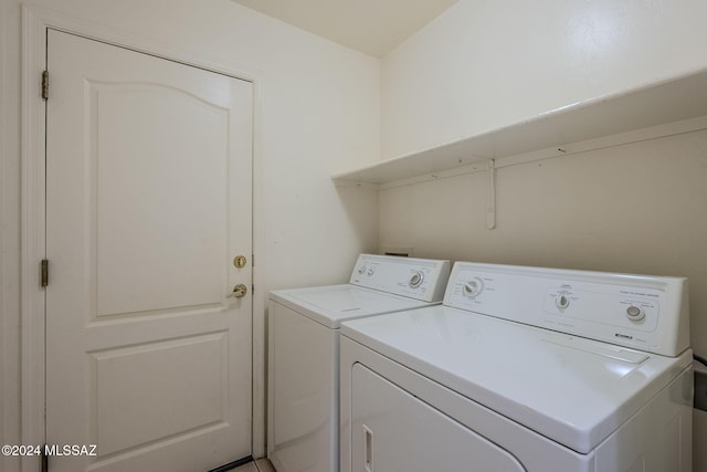 laundry area featuring washing machine and dryer