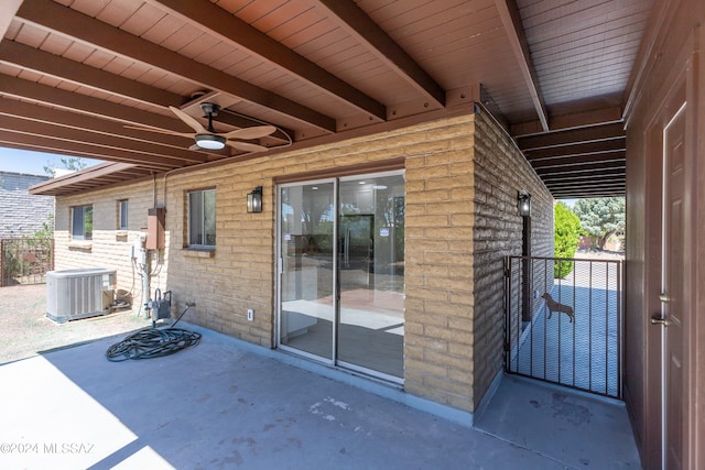 view of patio / terrace with ceiling fan and central AC unit