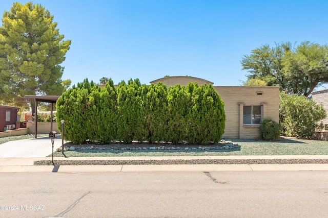 view of front of house with a carport