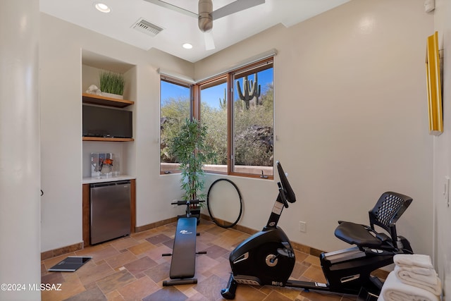 workout room with ceiling fan