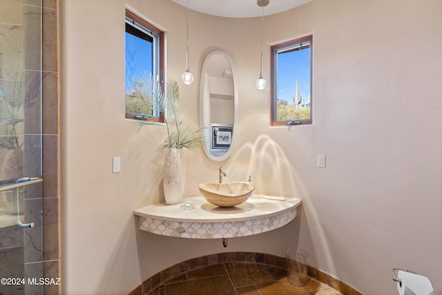 bathroom with tile patterned floors and sink