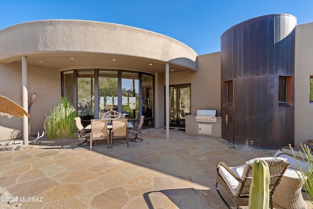 view of patio / terrace with a grill and exterior kitchen