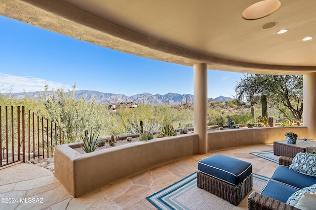 view of patio featuring a mountain view