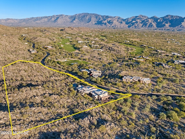 drone / aerial view featuring a mountain view