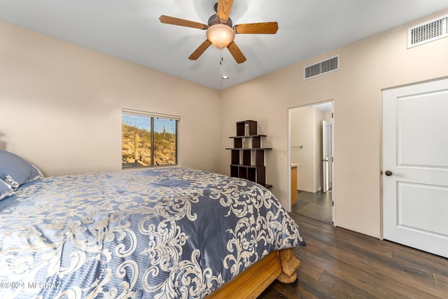 bedroom featuring ceiling fan and dark wood-type flooring