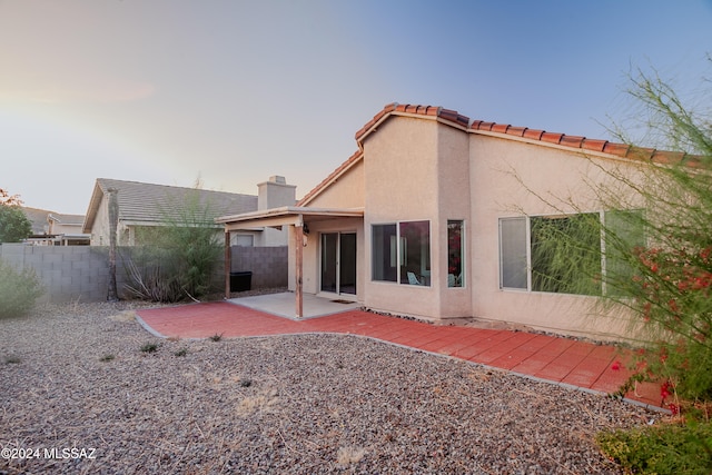 rear view of house with a patio area