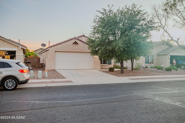 view of front of property with a garage