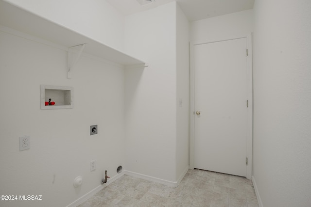 clothes washing area featuring hookup for a gas dryer, hookup for a washing machine, and hookup for an electric dryer