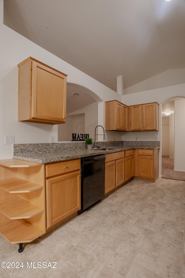 kitchen featuring light stone counters, sink, light brown cabinets, dishwasher, and lofted ceiling