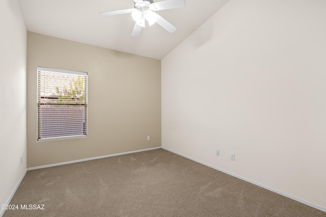 spare room featuring baseboards, carpet, and ceiling fan