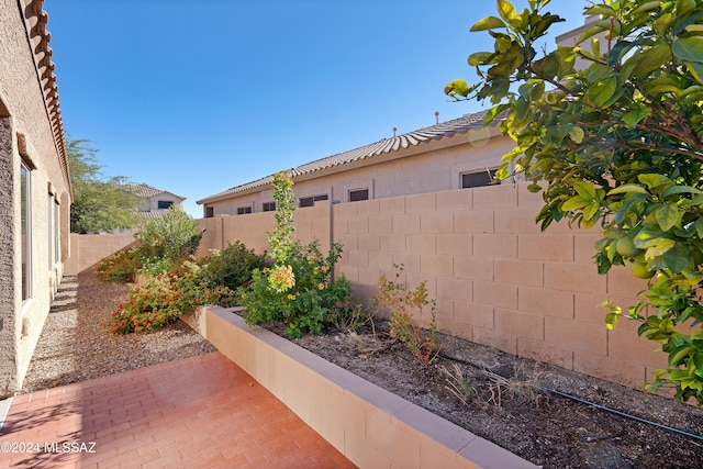 exterior space featuring a fenced backyard