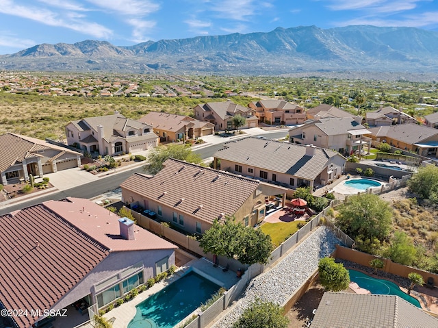 aerial view with a mountain view and a residential view