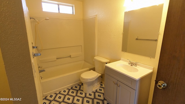 full bathroom with vanity, washtub / shower combination, and toilet