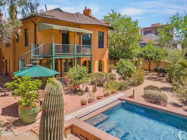 rear view of house with a patio area